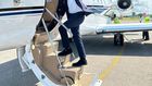 Eddie Butita boarding a plane