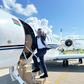 Eddie Butita boarding a plane