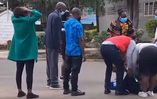 Family member faints at City Mortuary after viewing Josephine's body retrieved from Kware Dam, Mukuru Kwa Njenga