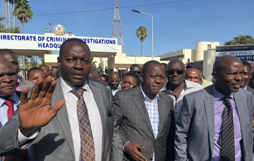 Dr Fred Matiang'i leaving the DCI headquarters after grilling