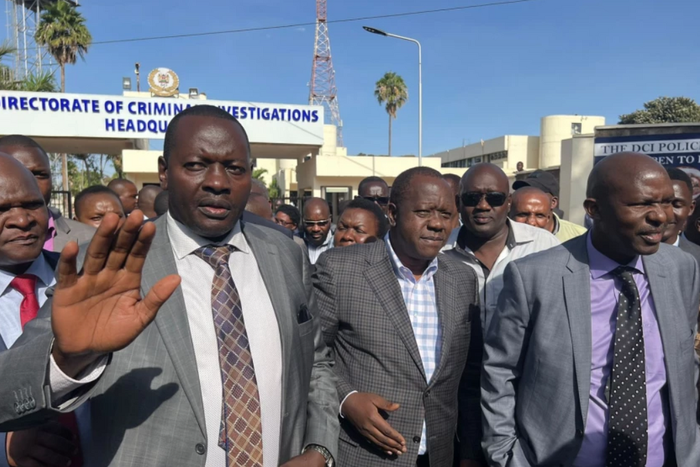 Dr Fred Matiang'i leaving the DCI headquarters after grilling