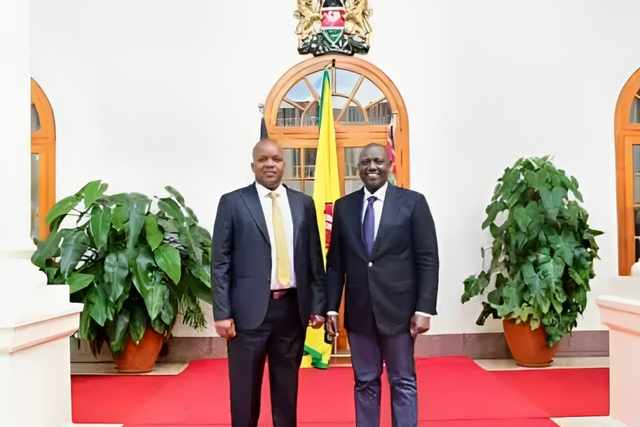 File image of Kitui East Member of Parliament Nimrod Mbai with President William Ruto