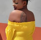 Fan tattoos Diana Bahati's face on her back