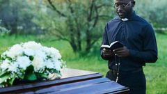 A pastor conducting a funeral