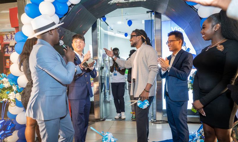 Its Official! TECNO team led by CAMON 20 Brand Ambassador, Nyashinski cut a ribbon to commemorate the official opening of the new TECNO Exclusive Store at the Garden City Mall