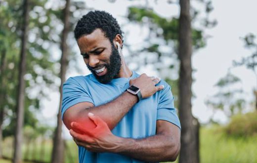Man experiencing post work out pain