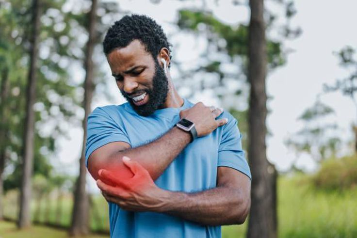 Man experiencing post work out pain