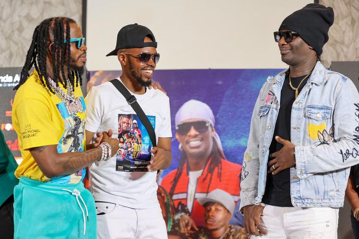 Diamon Platnumz together with Nameless and showrunner Alex Muhangi at the press conference (@JoachimShots)