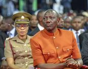 Ruto in Brown Kaunda Suit