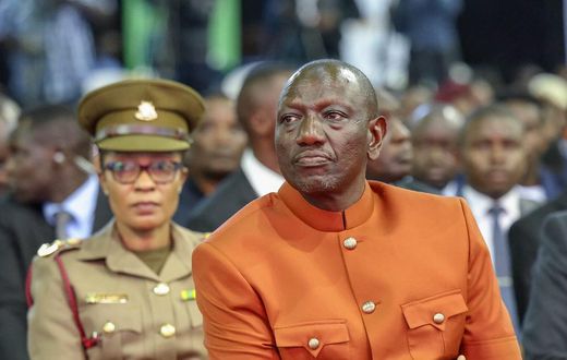Ruto in Brown Kaunda Suit