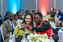 Cabinet Secretary Ministry of Youth Affairs, Creative Economy, and Sports Ababu Namwamba takes a selfie with Zara Basharat Higgs, Head of Public Policy Program, Pakistan, TikTok (left)