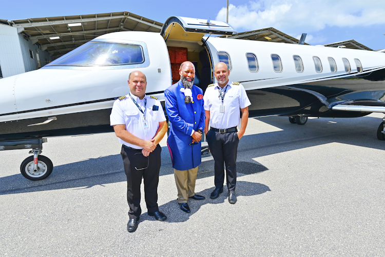 Prophet David Owuor with two pilots of a private jet he was honoured with for his gospel activitIes during his Brazil mission.