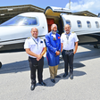 Prophet David Owuor with two pilots of a private jet he was honoured with for his gospel activitIes during his Brazil mission.