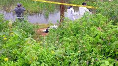 DCI probes a human head that was discovered at Kiambaa Dam in Kiambu