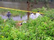DCI probes a human head that was discovered at Kiambaa Dam in Kiambu