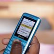 A Kenyan using their phone