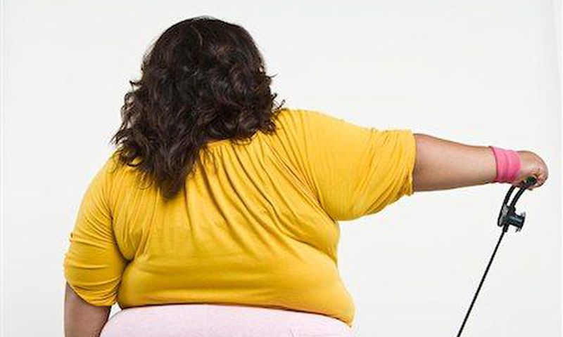 Back of a plus sized black woman [Masterfile]