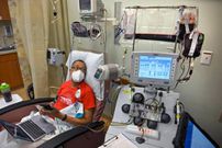A sickle cell disease patient receiving a blood transfusion to alleviate his pain at a hospital [Tammy Ljungblad/The Kansas City Star/Tribune News Service, via Getty Images]