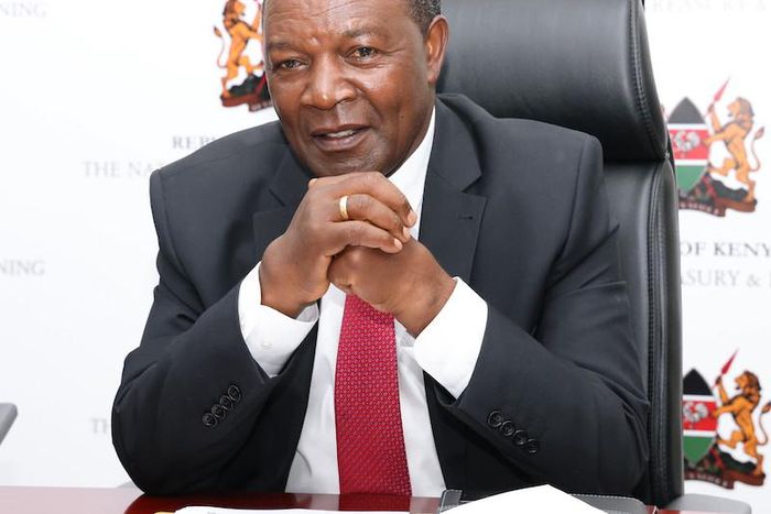 Treasury Cabinet Secretary Prof Njuguna Ndung'u chairing a meeting in his office in Nairobi