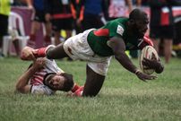 Joshua Bassingthwaighte (L) of Samurai RFC, tackles Dennis Ombachi of Kenya's national team Shujaa during the final of Safari Sevens, Kenya's annual rugby sevens tournament with professional and amature teams, in Nairobi, Kenya, on November 11, 2018. (Photo by Yasuyoshi CHIBA / AFP) (Photo credit should read YASUYOSHI CHIBA/AFP via Getty Images)