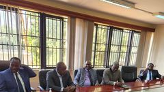 Dr Fred Matiang'i and his lawyers at the DCI