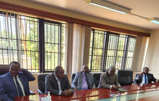 Dr Fred Matiang'i and his lawyers at the DCI