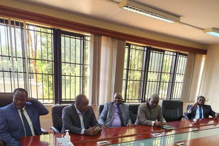 Dr Fred Matiang'i and his lawyers at the DCI