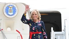 US First Lady Jill Biden waves as she walks off the plane as she arrives in Savannah, Georgia on July 8, 2021.