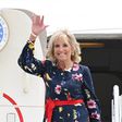 US First Lady Jill Biden waves as she walks off the plane as she arrives in Savannah, Georgia on July 8, 2021.