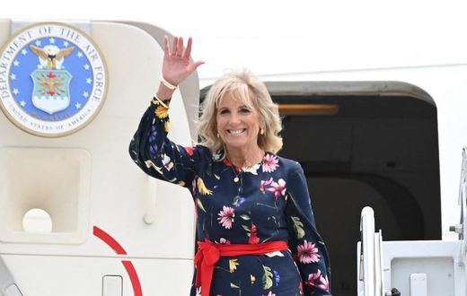 US First Lady Jill Biden waves as she walks off the plane as she arrives in Savannah, Georgia on July 8, 2021.