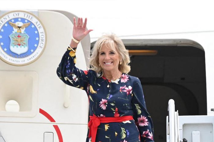 US First Lady Jill Biden waves as she walks off the plane as she arrives in Savannah, Georgia on July 8, 2021.