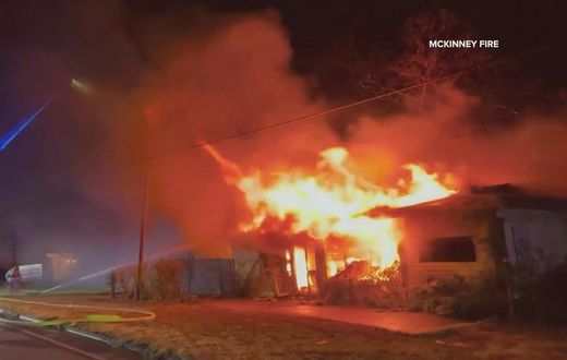 A photo of a building on fire