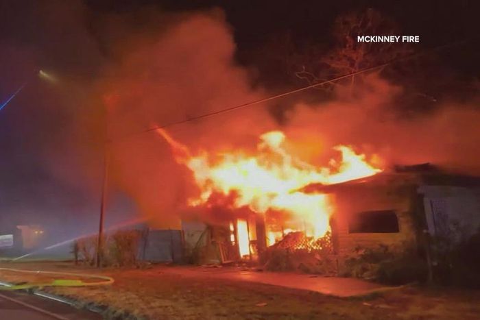 A photo of a building on fire