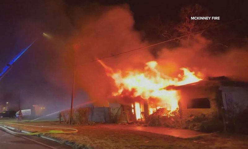 A photo of a building on fire