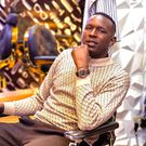 Comedian YY poses for a photo