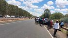 Kenyans gather along Eastern Bypass which borders Kenyatta family farm, Northlands