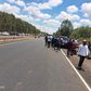 Kenyans gather along Eastern Bypass which borders Kenyatta family farm, Northlands