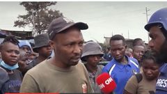 Larry Madowo comes to the aid of a man during maandamano on July 20 in Kamukunji area, Nairobi