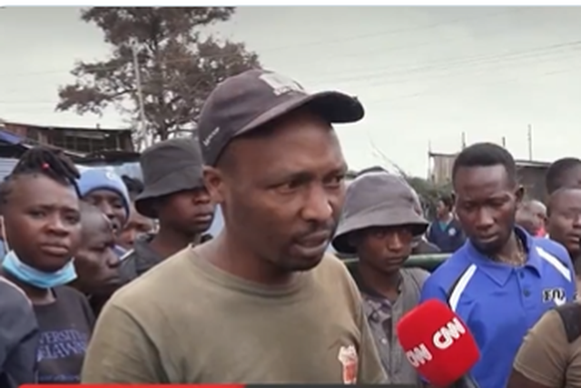 Larry Madowo comes to the aid of a man during maandamano on July 20 in Kamukunji area, Nairobi