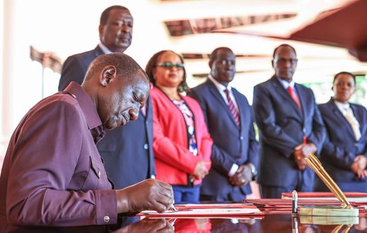 President William Ruto signs the County Governments Additional Allocations Bill at State House
