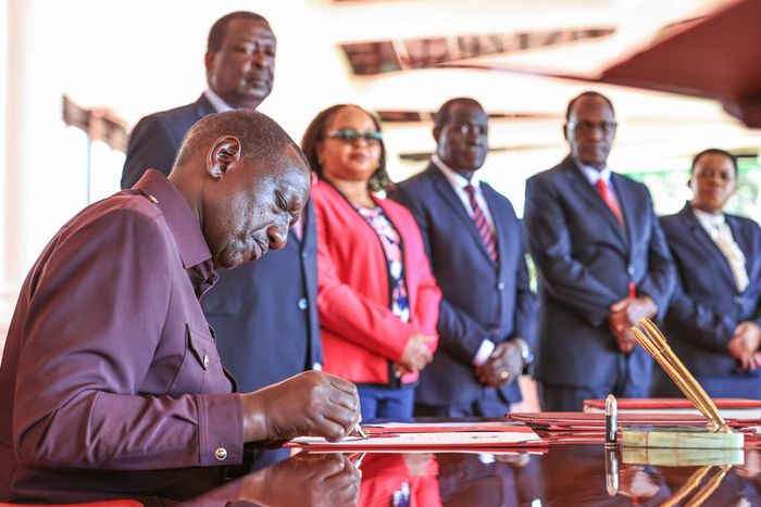President William Ruto signs the County Governments Additional Allocations Bill at State House