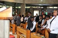 Sports CS Ababu Namwamba and his family at Consolata Shrine during the requiem mass of Prisca Mwaro