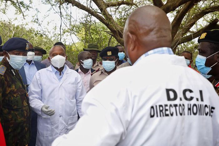 CS Kithure Kindiki with Senior Superintendent Martin Nyuguto during a visit to Shakahola, Kilifi county