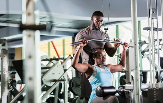 A lady training in a gym