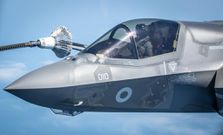A fighter jet refueling from the Royal Air Force VIP Voyager