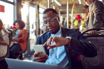 A man using a phone in public