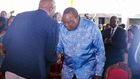 Retired President Uhuru Kenyatta greets CS Moses Kuria during the Episcopal Ordination for Bishops elect Simon Peter Kamomoe and Wallace Ng'ang'a at St Mary's Msongari.