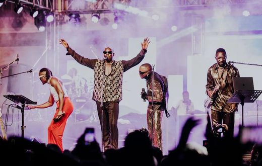 Sauti Sol members during a live performance