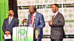 Outgoing IEBC Chair Wafula Chebukati and commissioners Boya Molu & Abdi Guliye during the launch of the Post-election Evaluation Report in Nairobi