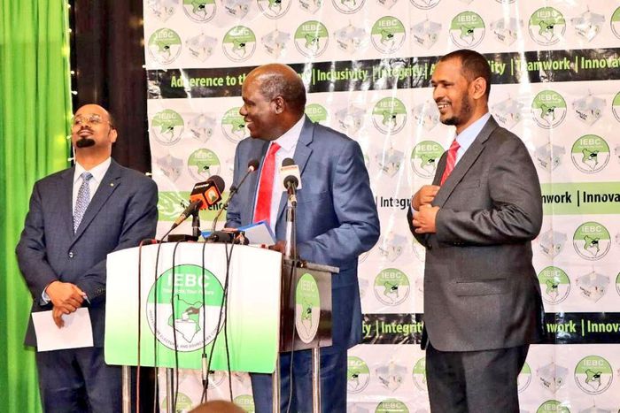 Outgoing IEBC Chair Wafula Chebukati and commissioners Boya Molu & Abdi Guliye during the launch of the Post-election Evaluation Report in Nairobi